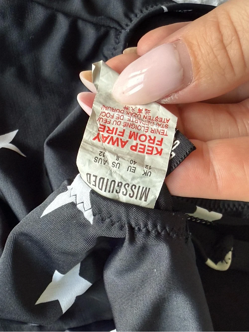 Missguided black with white stars one piece